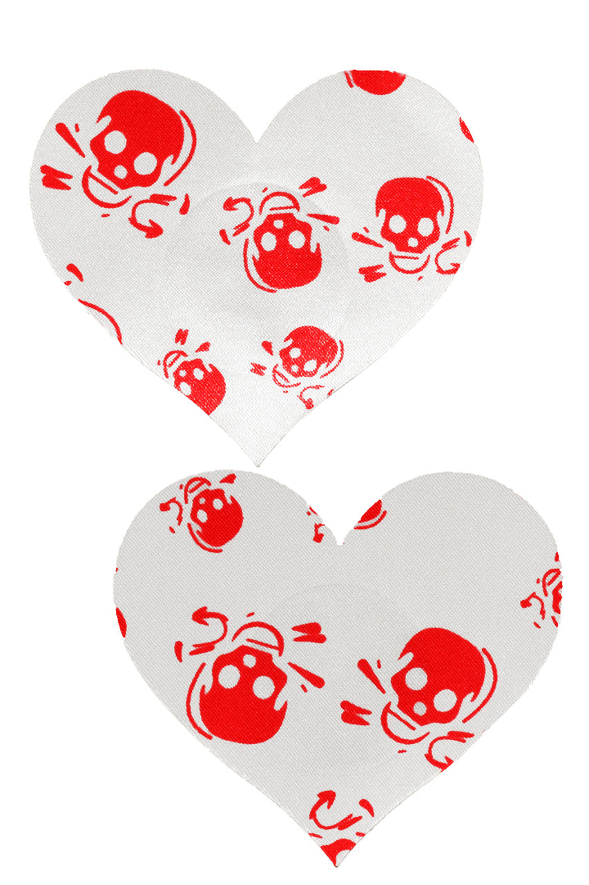 White heart pasties with red skull print